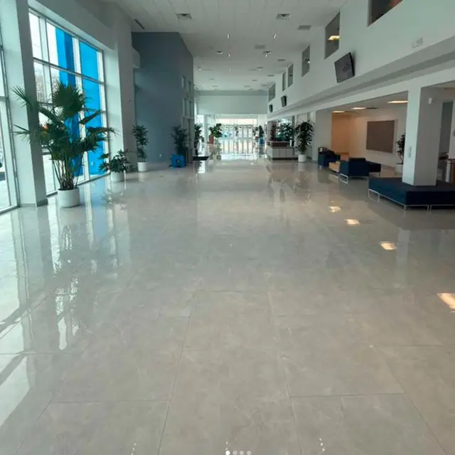 Car dealership showroom with new large-format tile floor
